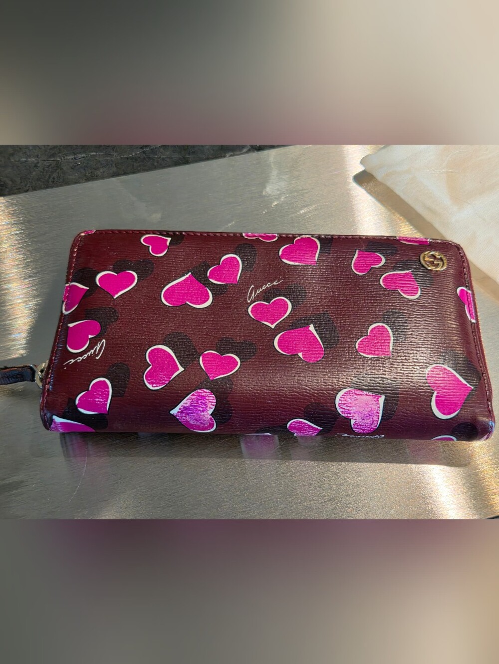 Gucci Zip-Around Wallet in Burgundy with Pink Heart Motif